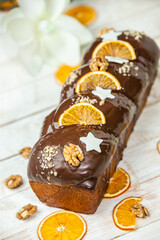 Panettone is the traditional Italian dessert for easter in 2021. Homemade panettone covered in chocolate and sprinkles. Bread served as dessert.