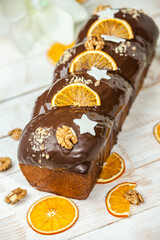 Panettone is the traditional Italian dessert for easter in 2021. Homemade panettone covered in chocolate and sprinkles. Bread served as dessert.