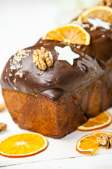 Panettone is the traditional Italian dessert for easter in 2021. Homemade panettone covered in chocolate and sprinkles. Bread served as dessert.