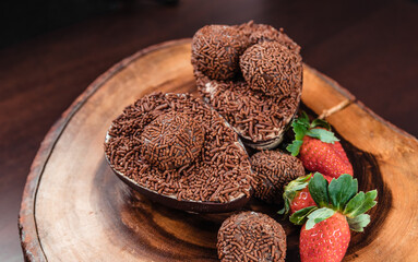 Chocolate Easter Egg filled with brigadeiro (brigadier) and strawberries, Goumert egg chocolate tradition in Brazil.