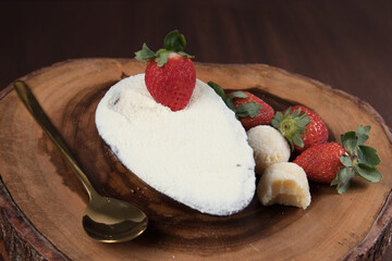Chocolate Easter Egg filled with powdered milk brigadeiro (brigadier), Goumert egg chocolate tradition in Brazil.