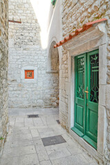 A small street in the medieval quarter of Trogir, an old Croatian town.