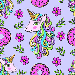 Obraz premium Cute seamless pattern with donuts, flowers and unicorn on a blue background.