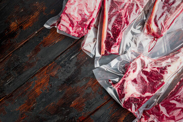 Beef steak vacuum sealed ready for sous vide cooking, tomahawk, t bone, club steak, rib eye and...