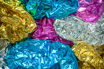 Colorful shiny foil background for the holiday