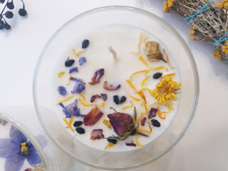 Handmade flower soy candles with herbs and crystals