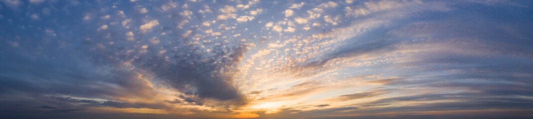 Panorama of Dramatic vibrant color with beautiful cloud of sunrise and sunset. Panoramic image.