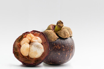 ripe mangosteen isolated on white background