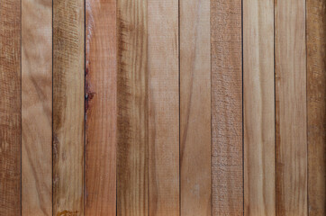 Texture of natural wood slats (unvarnished). Copper, reddish, cherry. Vertical sense.