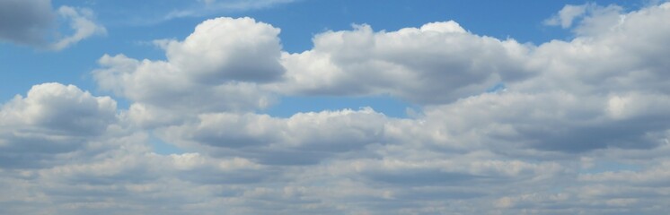 Panoramic view of blue sky with beautiful cloudscape, natural clouds background
