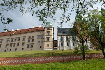 Fototapeta na wymiar Wawel Royal Castle in Krakow, Poland. Exterior view with defensive walls.