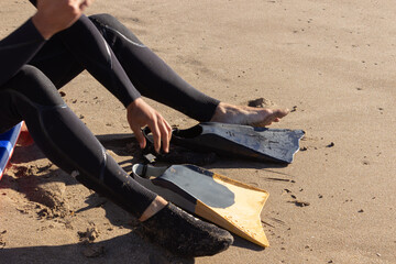 Man preparing to surf on a sunny day.