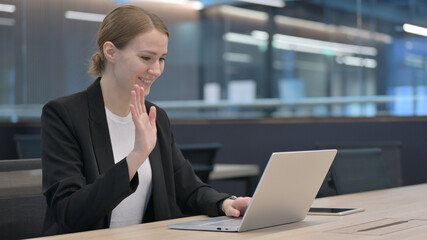 Fototapeta premium Businesswoman Talking on Video Call on Laptop 