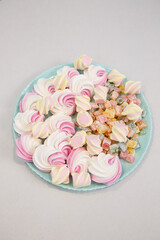 Plate with sweet fresh pink and tasty marshmallows