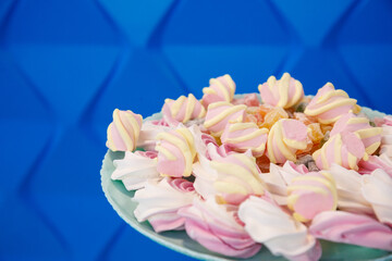 Plate with sweet fresh pink and tasty marshmallows