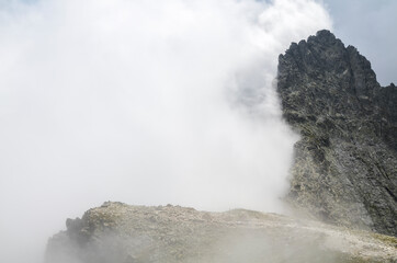 Scenery of high green mountains, sky with clouds. High Tatras Slovakia. Beautiful mountain landscape