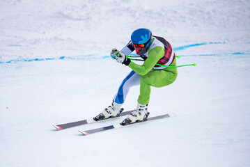 Skier on a slope of the alps