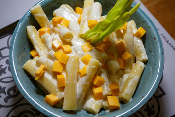 Delicious fresh hard pasta with cheese and herbs.