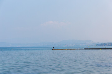 Pier on Garda lake, Blue lake with Pier