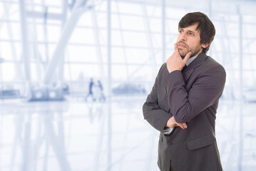 businessman thinking, at the office