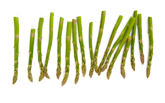 fresh green asparagus isolated on white background