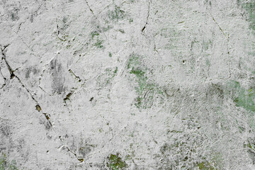 Texture of a concrete wall with cracks and scratches which can be used as a background