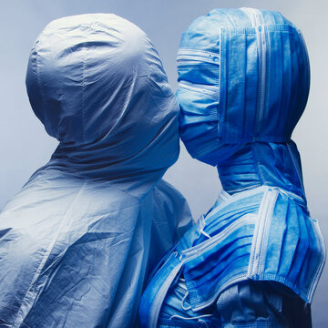 Man and Woman in medical  protection.  Surreal concept art.