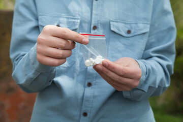 Man holding pills. Concept of medicine.