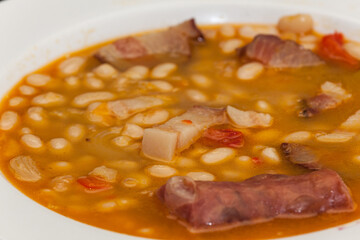 Pasta and beans with bacon and sausage
