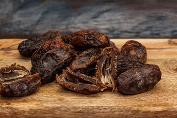dried dates on a wooden table