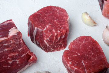 Raw fresh marbled meat Steak filet mignon , on white stone  surface