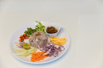 Rice Seasoned with Shrimp Paste Recipe or thai name Khaao Khlook Gabpi. A simple and basic Thai food. Each of the dish’s components is separately prepared, Thai Food.