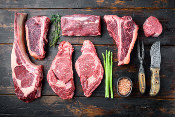 Variety of Raw Black Angus Prime meat steaks, tomahawk, t bone, club steak, rib eye and tenderloin...
