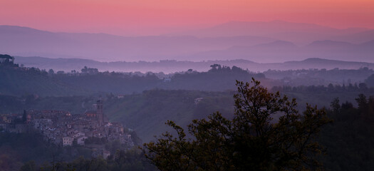 Naklejka premium Sun rising over the medieval village of Morlupo, in the Roman countryside