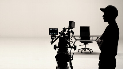 Silhouette of Behind the scenes or making of film. People working for shooting video production....