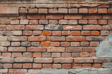 Old orange brick wall , red brick ,  old grunge stone wall  texture . Modern style  vintage brick texture