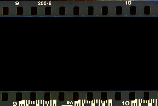 Film industry concept. Real film negative and border strip scanned. 135 negative scanned for use as photo frame. Vintage film 35mm. 