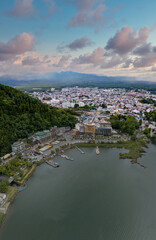 Vertical photo of Kawaguchi lake and townscape near lake side