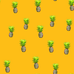 Seamless pattern of juicy and beautiful pineapples. Exotic vector illustration.