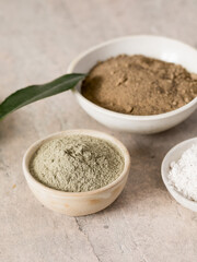 Fototapeta na wymiar Maca root powder hemp or cannabis flour and coca flour. Nutrition supplement - superfood from Andies