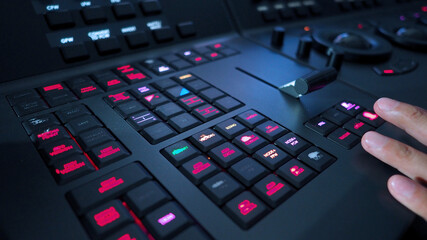 Color grading control panel in post video production process. Telecine controller machine and man...