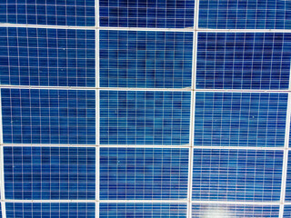 Aerial view of solar panels that convert directly sunlight into electricity