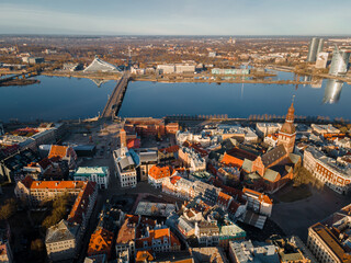 Aerial panorama view of old city Riga. Dome cathedral, bridges over River Daugava and National Librabry