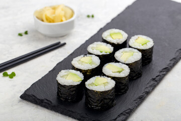 Mini sushi roll with avocado. Sushi menu. Japanese food.