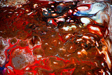 Texture in the style of fluid art. Abstract background with swirling paint effect. Liquid acrylic paint background. White, brown, blue and red colors.