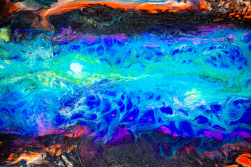 Obraz na płótnie Canvas Colorful background. Creative background with handmade abstract acrylic surface paints. Cover up various paints. Outer space concept in fluid art style.