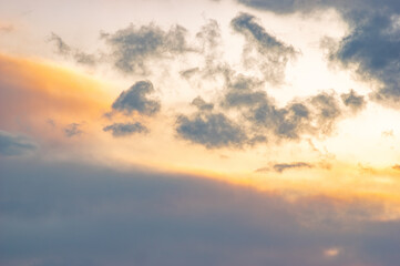 Clouds in winter in the mountains at sunset