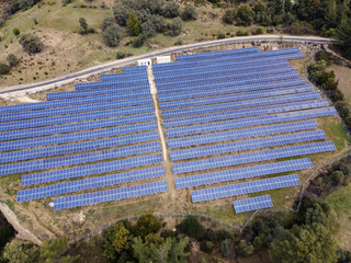 Solar panels fields on mountain for solar power. Renewable and green energy resource.