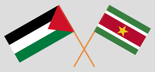 Crossed flags of Palestine and Suriname. Official colors. Correct proportion