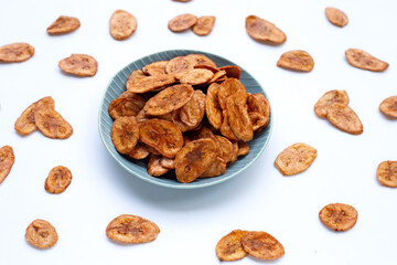 Banana chips on white background.